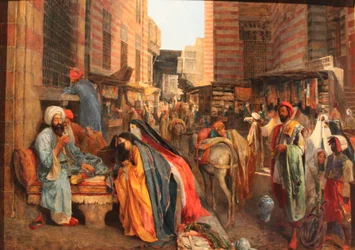 フランス語：La Rue et la mosquée al-Ghouri au Caire カイロのエル・グーリ・モスク近くの街並み