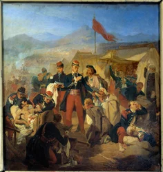 クリミア戦争：1854年5/11のインケルマンの戦いの後、軍医スクリーヴが負傷者を治療する。ジュール・リゴ（1810-1892）による絵画、1854年、パリ、ヴァル・ド・グラース美術館
