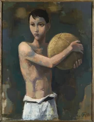 サッカーをする少年