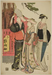聖なる松の木の根元にいる3人の女性