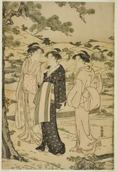 稲荷神社に参拝する女性
