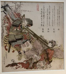 弁慶と中国人女性による綱引き
