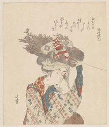 小枝と凧の束を持つ女性