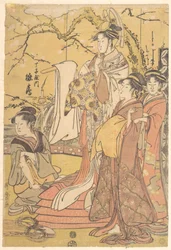 布団の山に立つ長寿屋の花魁雛鶴