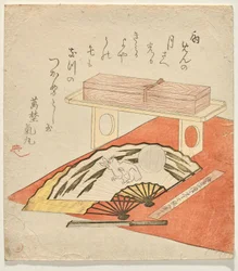 赤いフェルトのブランケットに描かれたウサギと月の扇絵
