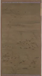 砂の上を降りるガチョウ
