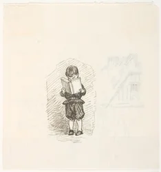 本を読んでいる少年