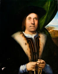 ロザリオを持つ男の肖像 1520年頃 油彩・パネル