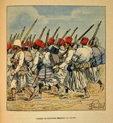 Henri Galli dit Galllichet (1854-1922)著、Louis Bombled (1862-1927)絵の「マダガスカルの戦争-1885-1895年のフランス遠征の逸話史」。1895年に行進するハウサ・ティライユ隊の隊列、個人蔵