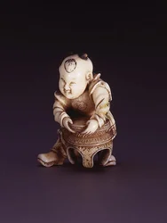 唐子を描いた根付 1830年頃（象牙）