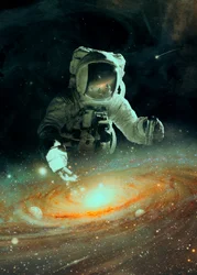銀河の上を飛ぶ宇宙飛行士