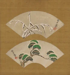 雪を積んだ草と雪を積んだ松の枝