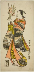 花を持つ若い女性