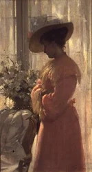 ピンクのインテリアの女性