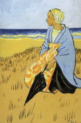 海岸に座っているブルトンの女性