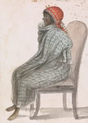 Mulher africana sentada em uma cadeira
