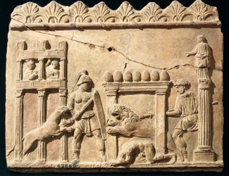 サーカスで戦うライオンと剣闘士を描いたローマ時代のレリーフ