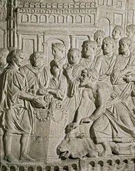 ローマ美術：ローマ人に貢ぎ物をするサルマット市民を表す低層レリーフ。マルク・オーレル（Marc-Aurele）の柱のレリーフより。紀元2世紀。ローマ、ローマ市民博物館