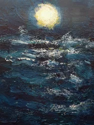 海に浮かぶ満月