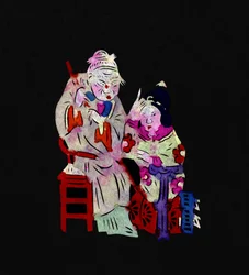 老女と少女のカップル。中国の民芸品である切り絵「簡子」。