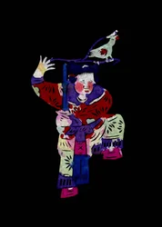 鳥と剣を持つ女性のキャラクター。中国の民芸品である切り絵「簡子」。
