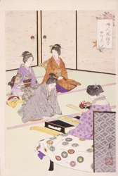 部屋に座っている 4 人の女性