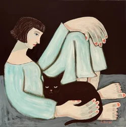物思いにふける女性と黒猫