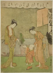 粉屋の前で男の子と二人の女性
