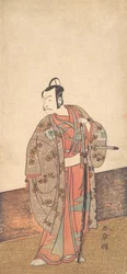 家の中と縁側の前に立つ俳優の五代目市川團十郎。 1772年。