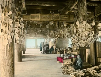 1900～1915年頃、宮島・千畳敷の飯匙売り（写真）