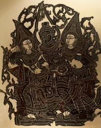 ダサカンタとその妻たちを表すナン・ヤイ影絵人形劇の場面、彫刻革板、タイ、タイ文明