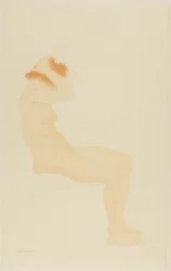 髪を直す横顔の女性