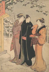 黒い羽織を着た男性と寺に近づく二人の女性。