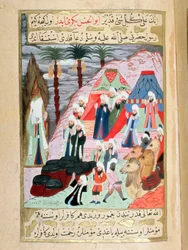 バドルの戦いの前に、雨が降ってイスラム教徒が助かるように祈る預言者ムハンマド（ムハンマドまたはムハンマド）（570-632）（顔を覆っている）ミニチュア エルゼニが書いたトルコ語の原稿から、セイヤイド・スレイマン・パシャが絵を描いたもので、再録されている。