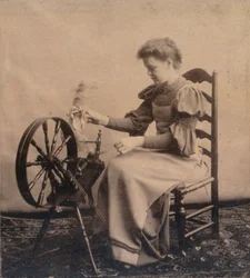 糸車c1900の女性