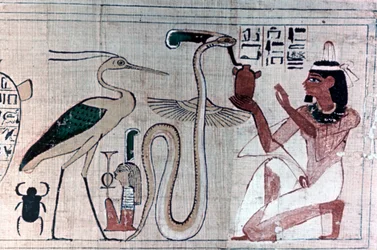 ヘビの前にひざまずいて古代エジプトの死のパピルス