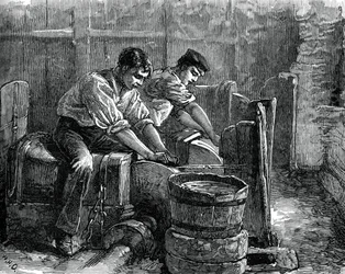 ホイール作業中のグラインダー、c1880
