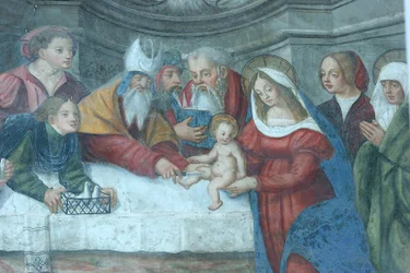 聖マリア大聖堂の扉のフレスコ画「神殿のイエス」 アオステ イタリア