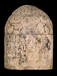 Re と Atum の神聖な猫の崇拝を描いた石灰岩の石碑、XIX 王朝 c1292-c1190