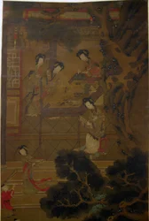 庭の女性。