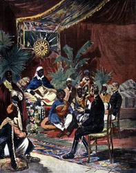 1896年にイタリアがアドゥアで敗北した後、エチオピアとの和平交渉が始まった。サルサ少佐とアンヘラ大尉は、メネリク2世（1844〜1913）とその族長たちに会った。シルエットによる19世紀末のプレスのイラスト。