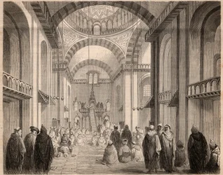 1862年、アルジェの大モスクで行われたラマダン（イスラム教の月齢）の祈り。1862年の「Le Monde illustrious」誌に掲載されたエングレーヴィング。個人蔵。