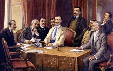 L.デルレアーニ（1840〜1908）によるフィアットの創設者たち。左から（着席）。ビソメッティ伯爵、ラッカ弁護士、ブリチェロッソ伯爵、チェリアーナ、ジョヴァンニ・アニェッリ、スカルフィオッティ弁護士、フェレーロ、（立）ルイジ・ダメーヴィーノ、ゴリア・ガッティ弁護士。Sd.19世紀末
