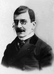 フランスの文芸評論家、フェルディナン・ブルネティエール（1849-1906）の肖像。