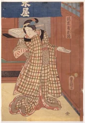 タブレットを持つ女性（カラー木版画）