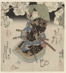 桜の木の下に立つ侍