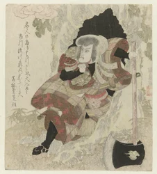 斧を持った男が木から降りる