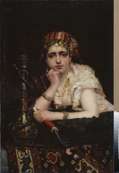 オダリスク。 （水ギセルを持って憂鬱な視線を持つハーレムの女性の肖像）。 Vasili Dmitrievich Polenov (1844-1927) による絵画、キャンバスに油彩。 19世紀ロシアの芸術、オリエンタリズム。 ベラルーシ共和国国立美術館、ミンスク（ビエロル）