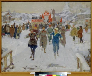 コルホーズを訪れる赤軍。 制服を着た兵士たちは、赤い旗で飾られた表彰台の近くに集まった住民の視線の下で、若い女性を伴って、木造家屋のある村の通りでスキーをしています。 の絵