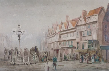 1860年、ロンドンのホルボーンとステイブル・インの南側に沿って東を望む。          